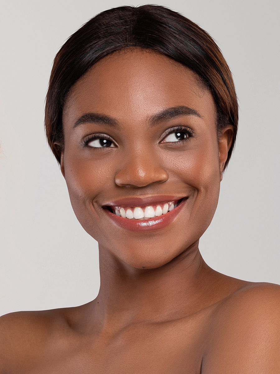 Woman with red lipstick smiling