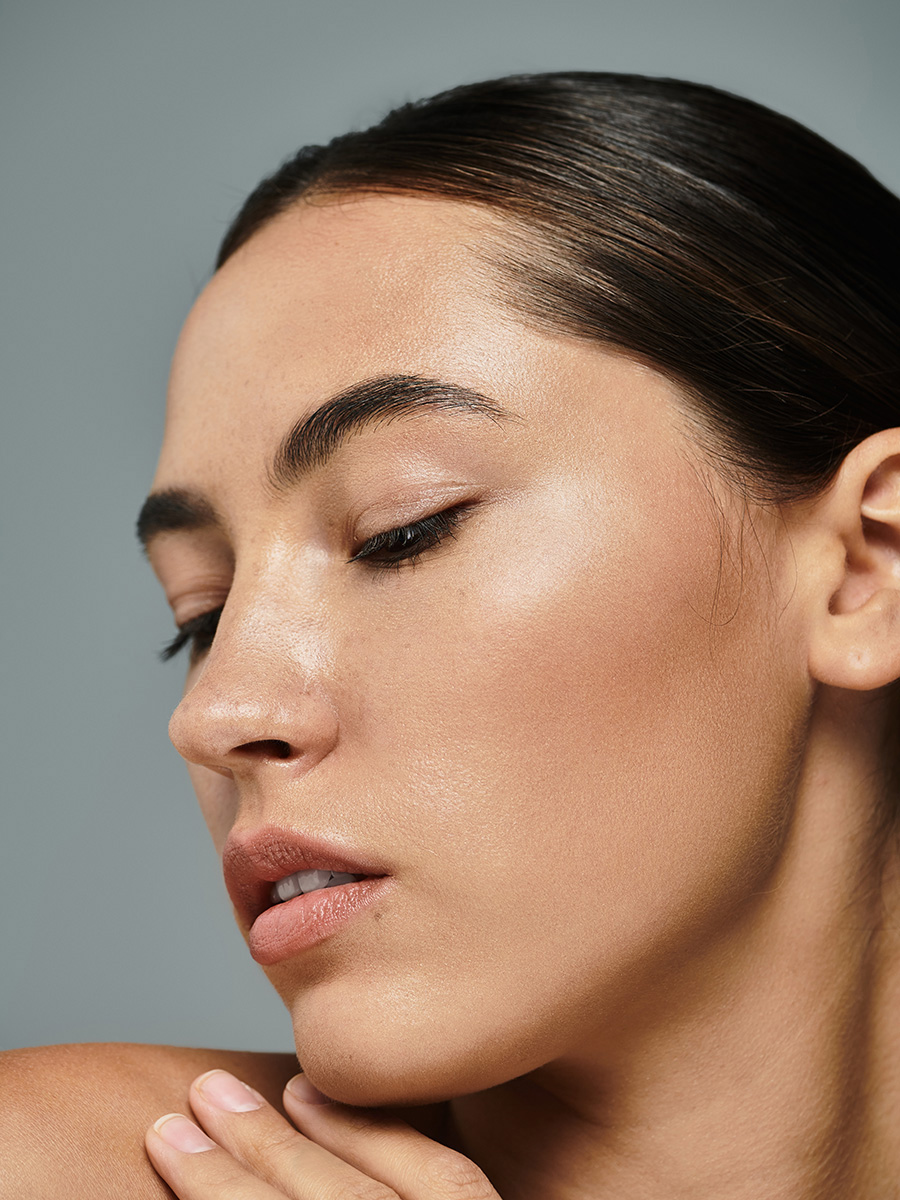 Up close of a womans face with eyes closed