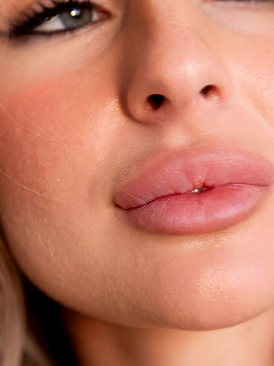 Up close of a woman with plump lips