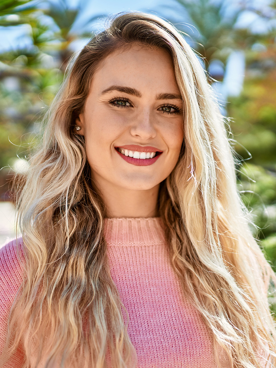 Woman in a pink sweater