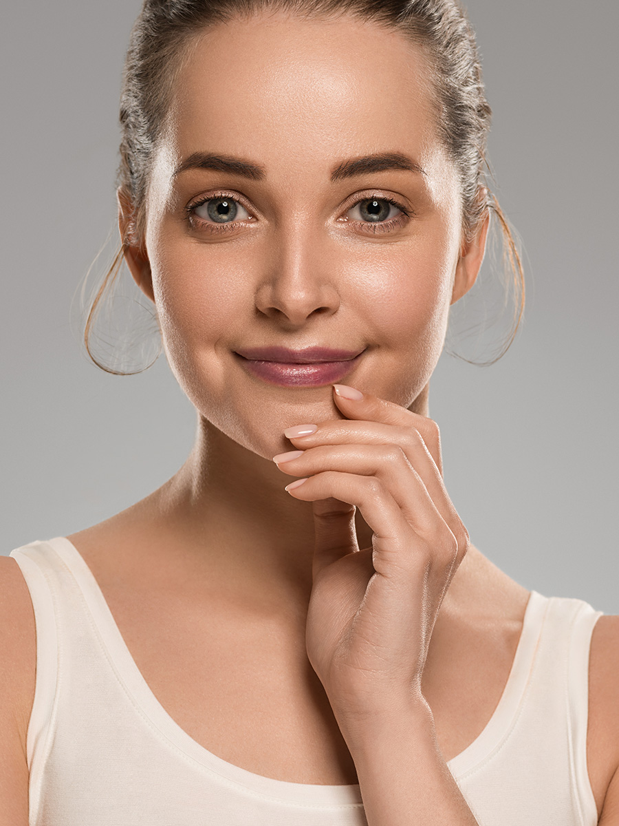 Woman touching her chin